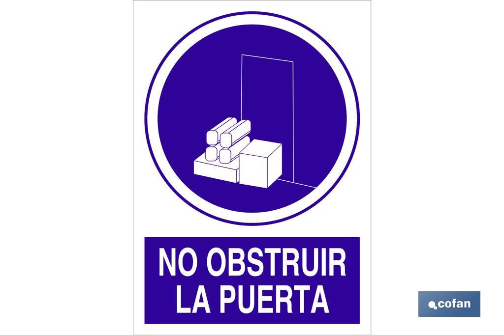 No obstruir la puerta - Cofan