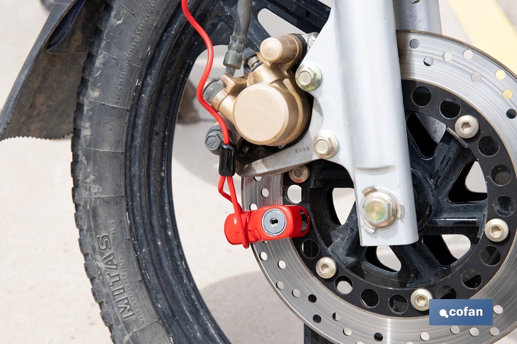 Candado de freno de disco | Cable rojo de 1 metro | Ideal para bicicleta, moto o patinete | Incluye 2 llaves tubulares | Cuerpo de aleación | Medidas: 7,5 x 2,5 x 5,8 cm - Cofan