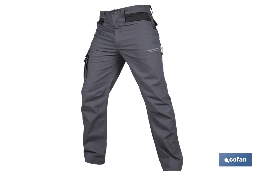 Pantalón de trabajo modelo Loki en gris | Elástico, ligero con múltiples bolsillos | Materiales: 65 % poliéster, 32 % algodón | Disponible en amplio rango de tallas - Cofan