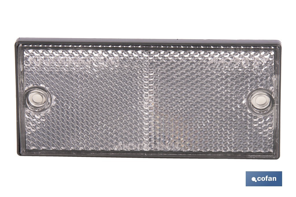 Rectangular reflector with 2 holes and adhesive backing | Screws not included | Approved product | Available in 3 different colours | Size: 106 x 50 mm - Cofan