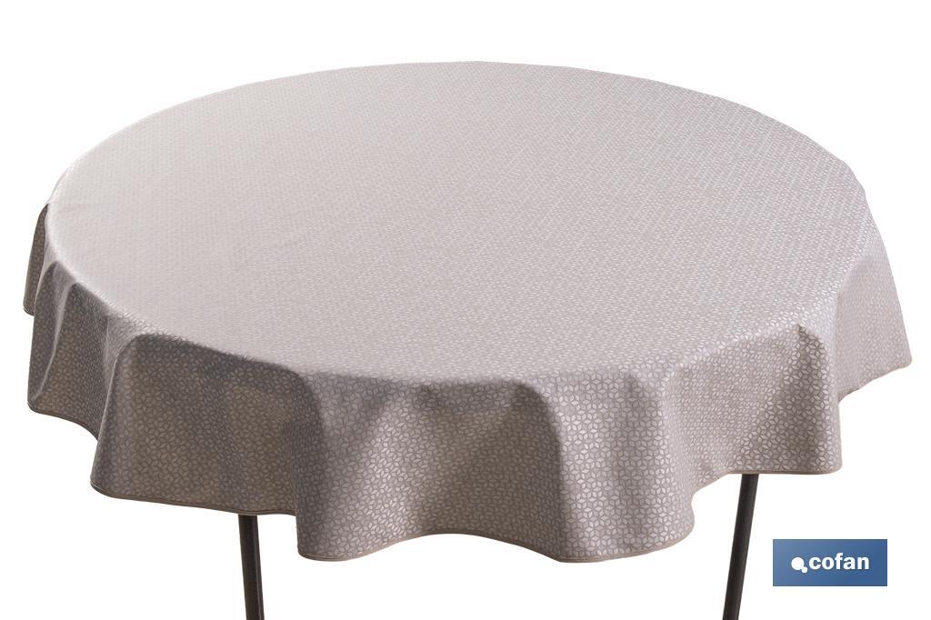 Mantel redondo antimanchas confeccionado en Jacquard con tejido resinado | Diseño de pétalos sobre beige | Materiales: 50% algodón y 50% poliéster | Diferentes medidas - Cofan