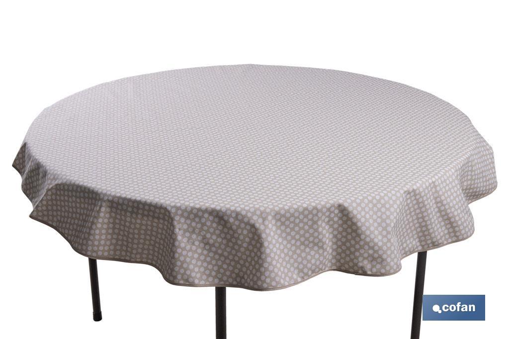 Mantel redondo antimanchas resinado con estampado de topos blancos | Materiales: 50% algodón y 50% poliéster | Diámetro: 1,40 m - Cofan