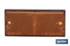 Rectangular reflector with 2 holes and adhesive backing | Screws not included | Approved product | Available in 3 different colours | Size: 106 x 50 mm - Cofan