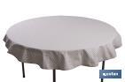 MANTEL REDONDO ANTIMANCHAS RESINADO CON ESTAMPADO DE TOPOS BLANCOS | MATERIALES: 50% ALGODÓN Y 50% POLIÉSTER | DIÁMETRO: 1,40 M