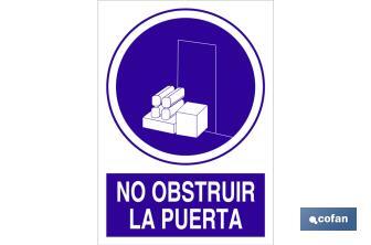 No obstruir la puerta - Cofan