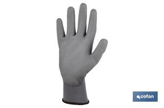 100% polyester gloves | Impregnated glove for added safety | Flexible gloves | Comfort and protection | Seamless gloves - Cofan