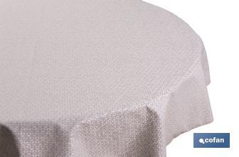 Mantel redondo antimanchas confeccionado en Jacquard con tejido resinado | Diseño de pétalos sobre beige | Materiales: 50% algodón y 50% poliéster | Diferentes medidas - Cofan