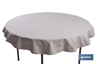 Mantel redondo antimanchas resinado con estampado de topos blancos | Materiales: 50% algodón y 50% poliéster | Diámetro: 1,40 m - Cofan