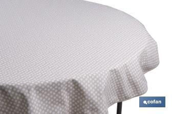 Mantel redondo antimanchas resinado con estampado de topos blancos | Materiales: 50% algodón y 50% poliéster | Diámetro: 1,40 m - Cofan