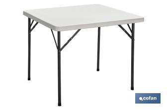 Table pliante carrée de couleur blanche | Poids maximal : 120 kg | Appropriée pour 6 personnes | Dimensions ouverte : 88 x 88 x 74 cm  - Cofan